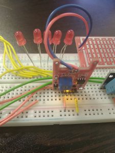 breadboard with sensors and led lights